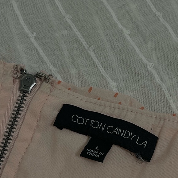 Light pink spotted tank top. Ruched mid section with adjustable straps and tie - Picture 4 of 5